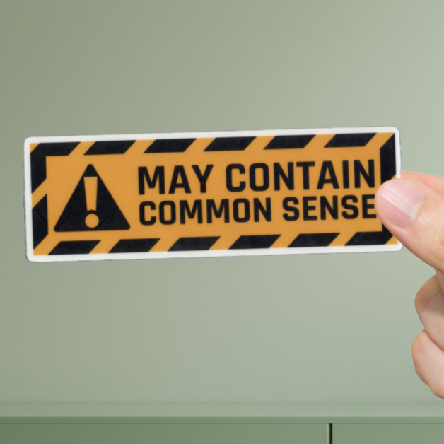 Durable, vinyl, die-cut, May Contain Common Sense Sticker.