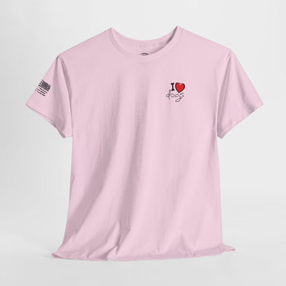 Pink t-shirt with 'I ❤️ dogs' design on a light gray background