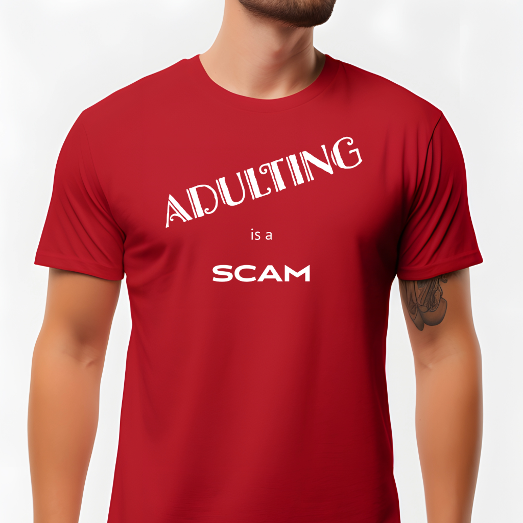 Ollie's: "Adulting Is a Scam" - 100% Cotton Graphic T-Shirt