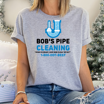 Ollie's: "Bob's Pipe Cleaning" - 100% Cotton Graphic T-Shirt