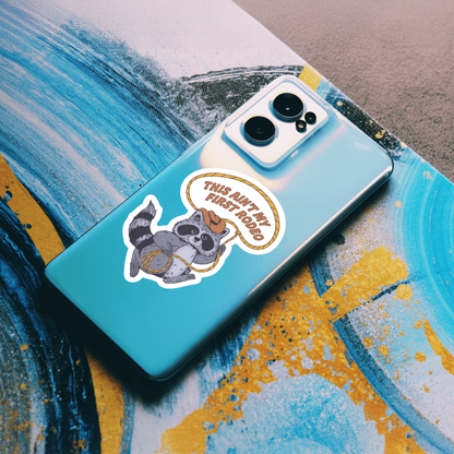 Durable vinyl, die-cut Ain't My First Rodeo Sticker with a racoon.