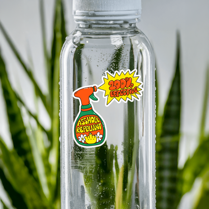 Clear water bottle with a Durable, die-cut Asshole Repellent Sticker.