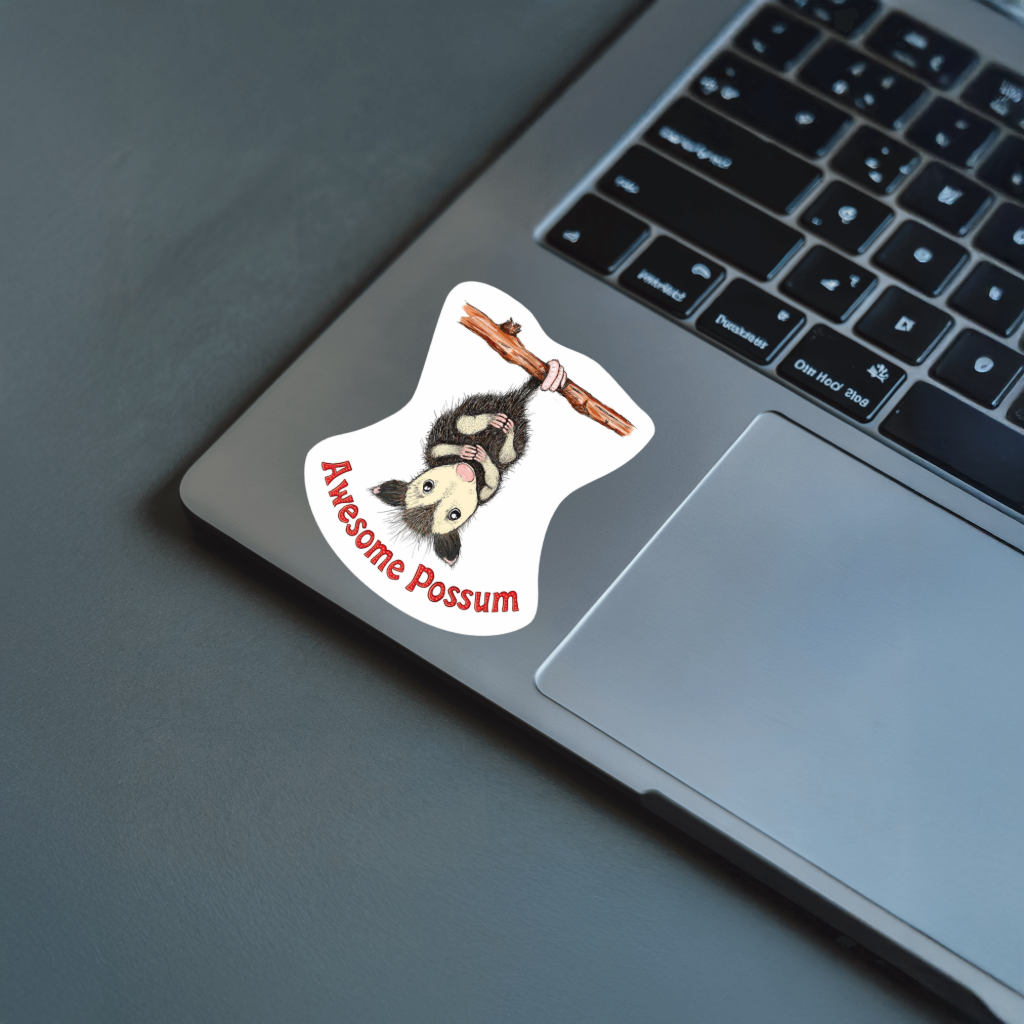 Sticker of a possum with 'Awesome Possum' text on a laptop.  Durable vinyl, die-cut sticker.  