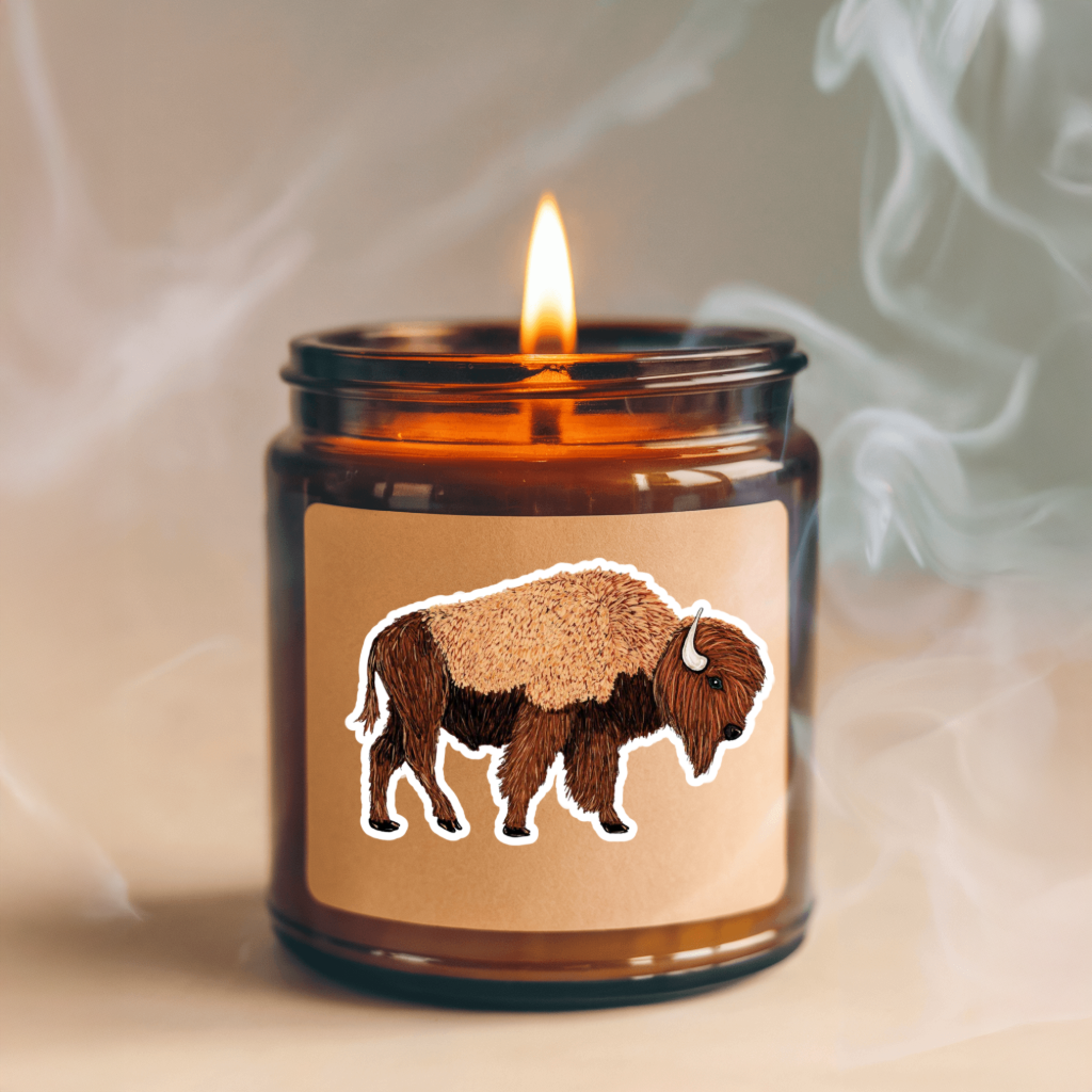 Candle in a glass jar with a bison sticker.  High-quality, vinyl, die-cut, sticker. 