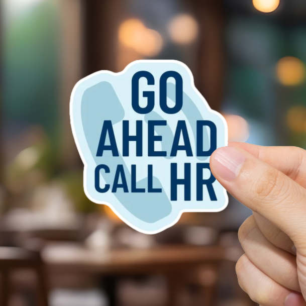 Hand holding a 'GO AHEAD CALL HR' sticker in a blurred restaurant setting