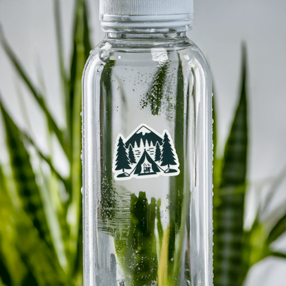 Durable vinyl, die-cut Campsite Sticker with tents and trees.