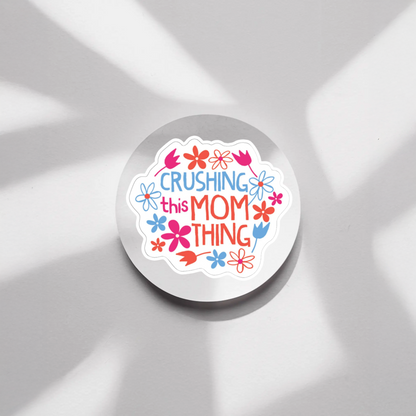 Durable vinyl die-cut Crushing This Mom Thing Sticker. 