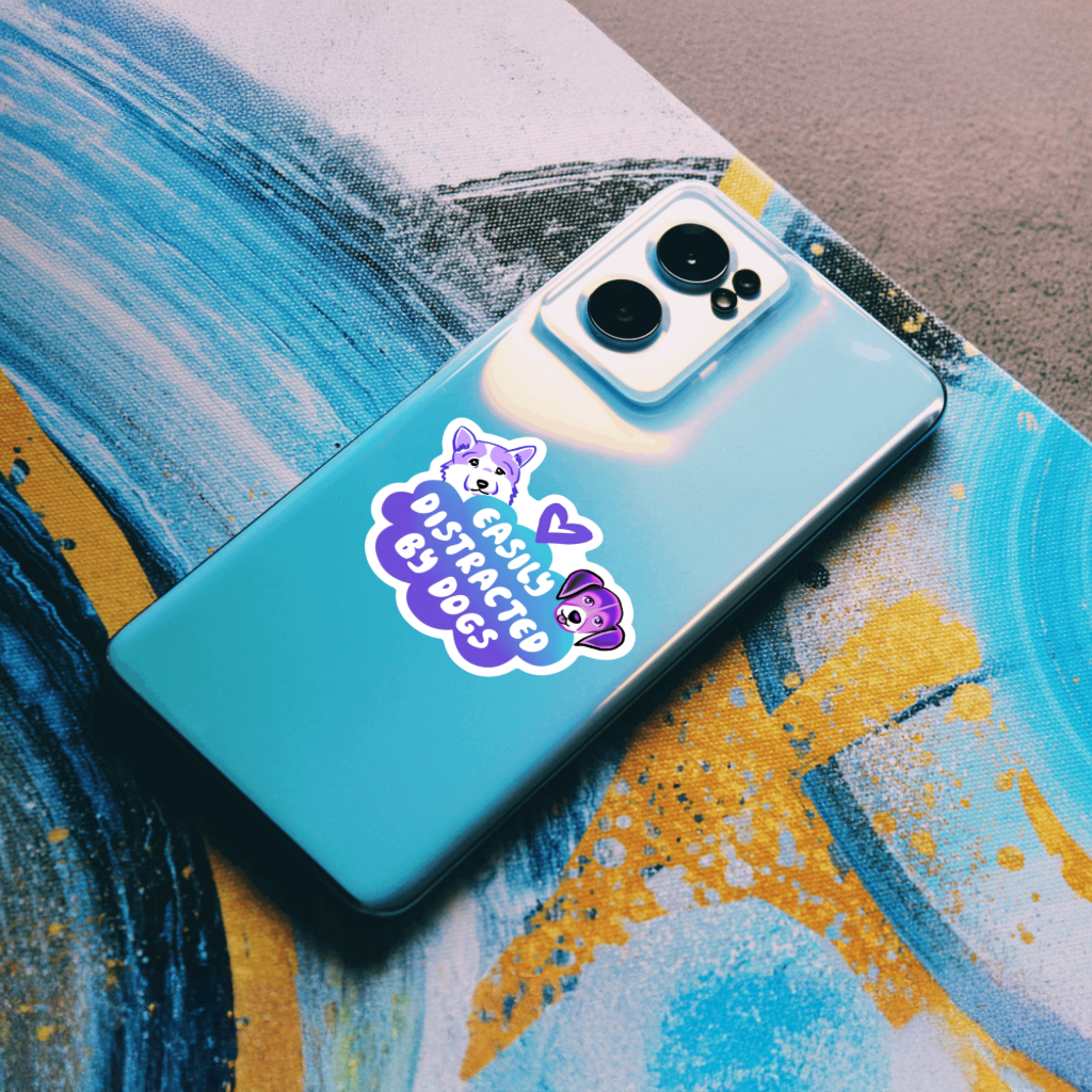 Durable, vinyl, die-cut, Easily Distracted By Dogs Sticker.