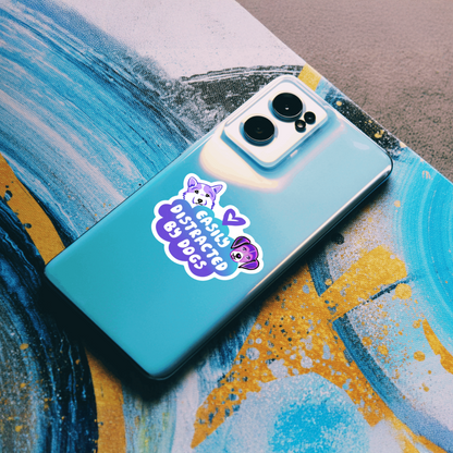 Durable, vinyl, die-cut, Easily Distracted By Dogs Sticker.