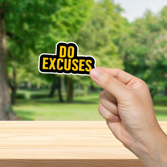 Hand holding a 'DO EXCUSES' sticker with a blurred green outdoor background