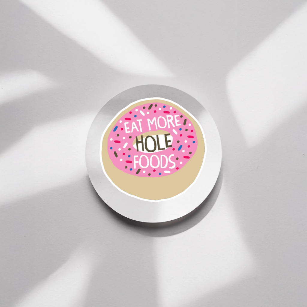 Durable, vinyl, die-cut, Eat More Hole Foods Sticker.