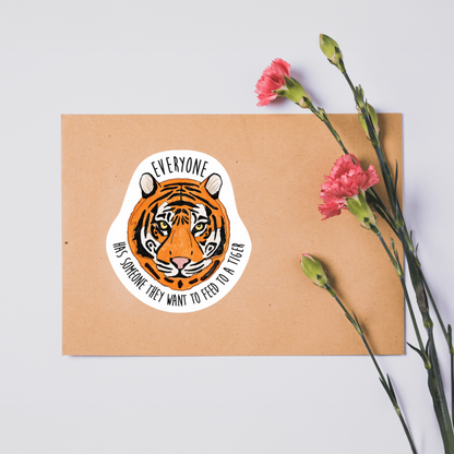Durable, vinyl, die-cut, Feed Someone To A Tiger Sticker.