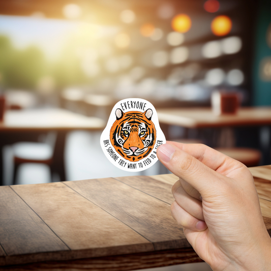 Durable, vinyl, die-cut, Feed Someone To A Tiger Sticker.