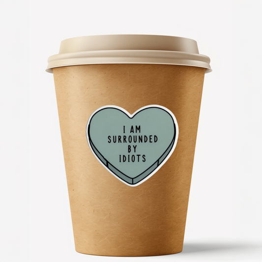 Durable, vinyl, die-cut, Surrounded By Idiots Sticker.