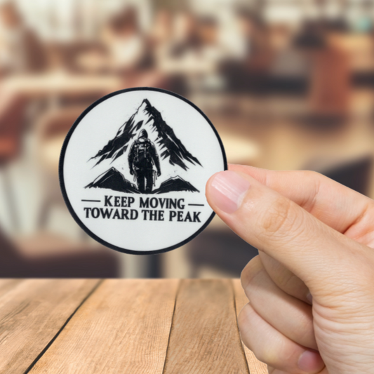 Durable, vinyl, die-cut, Keep Moving To The Peak Sticker.