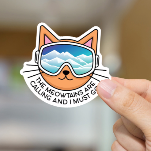 Durable, vinyl, die-cut, Meowtains Sticker.