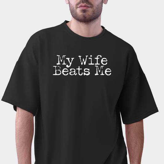 Ollie's: My Wife Beats Me T-Shirt, Dark - 100% Cotton