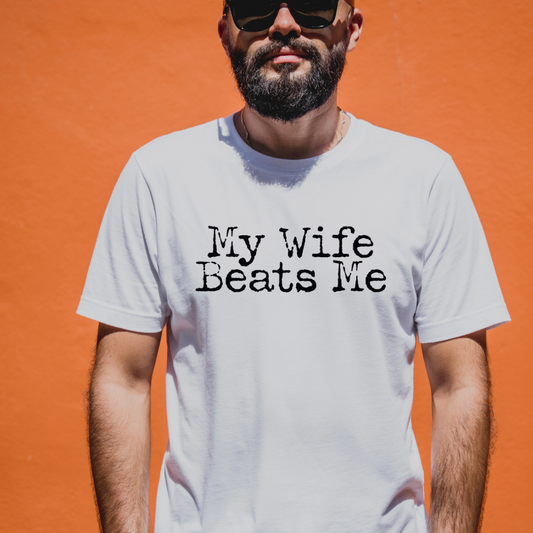Ollie's: My Wife Beats Me T-Shirt, Light - 100% Cotton
