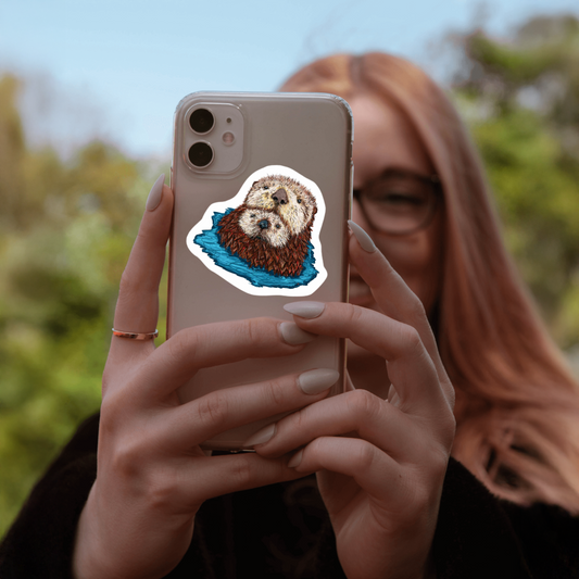 Durable, vinyl, die-cut, Mom & Baby Otter Art Sticker.