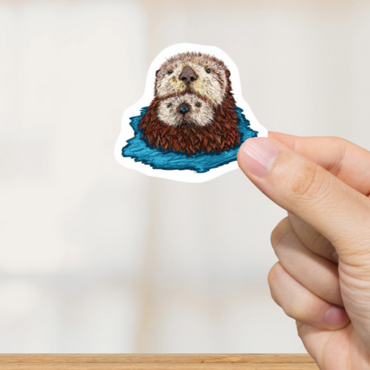 Durable, vinyl, die-cut, Mom & Baby Otter Art Sticker.