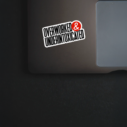 Durable, vinyl, die-cut, Overworked & Under Intoxicated Sticker.