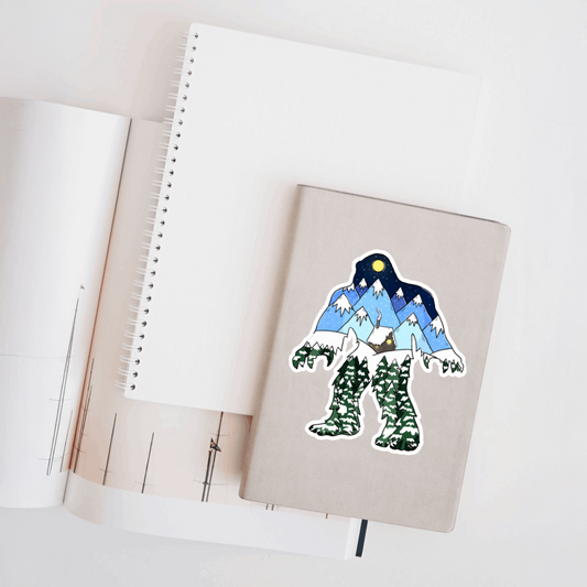 Durable, die-cut, vinyl, Squatch Winter Cabin Sticker.