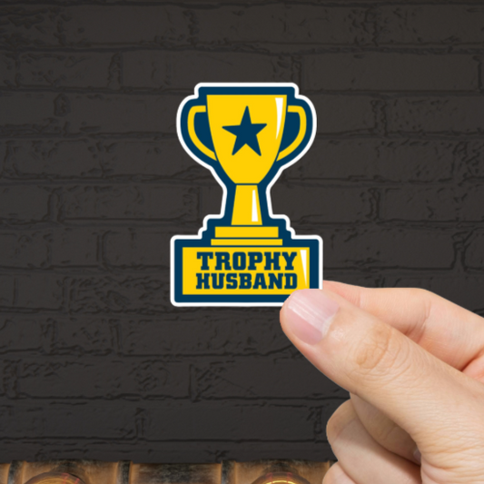 Durable, vinyl, die-cut, Trophy Husband Sticker.
