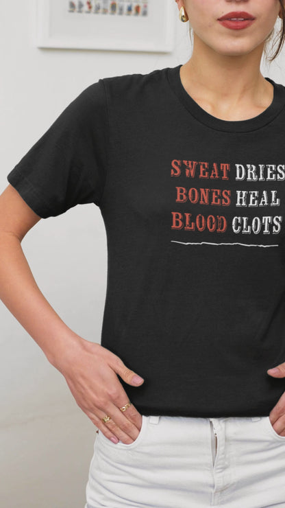 Ollie's: 'Sweat Dries Bones Heal Blood Clots'- 100% Cotton T-shirt.